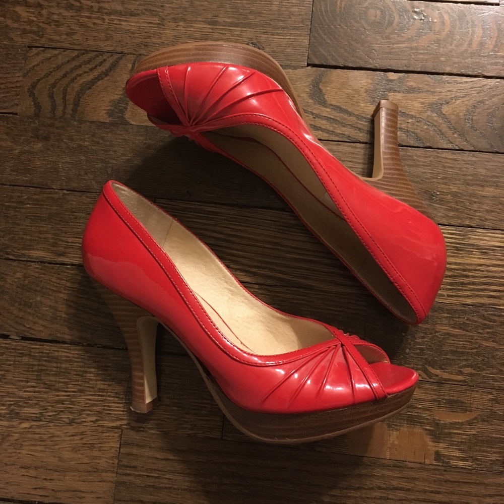 Red peep toe pumps
